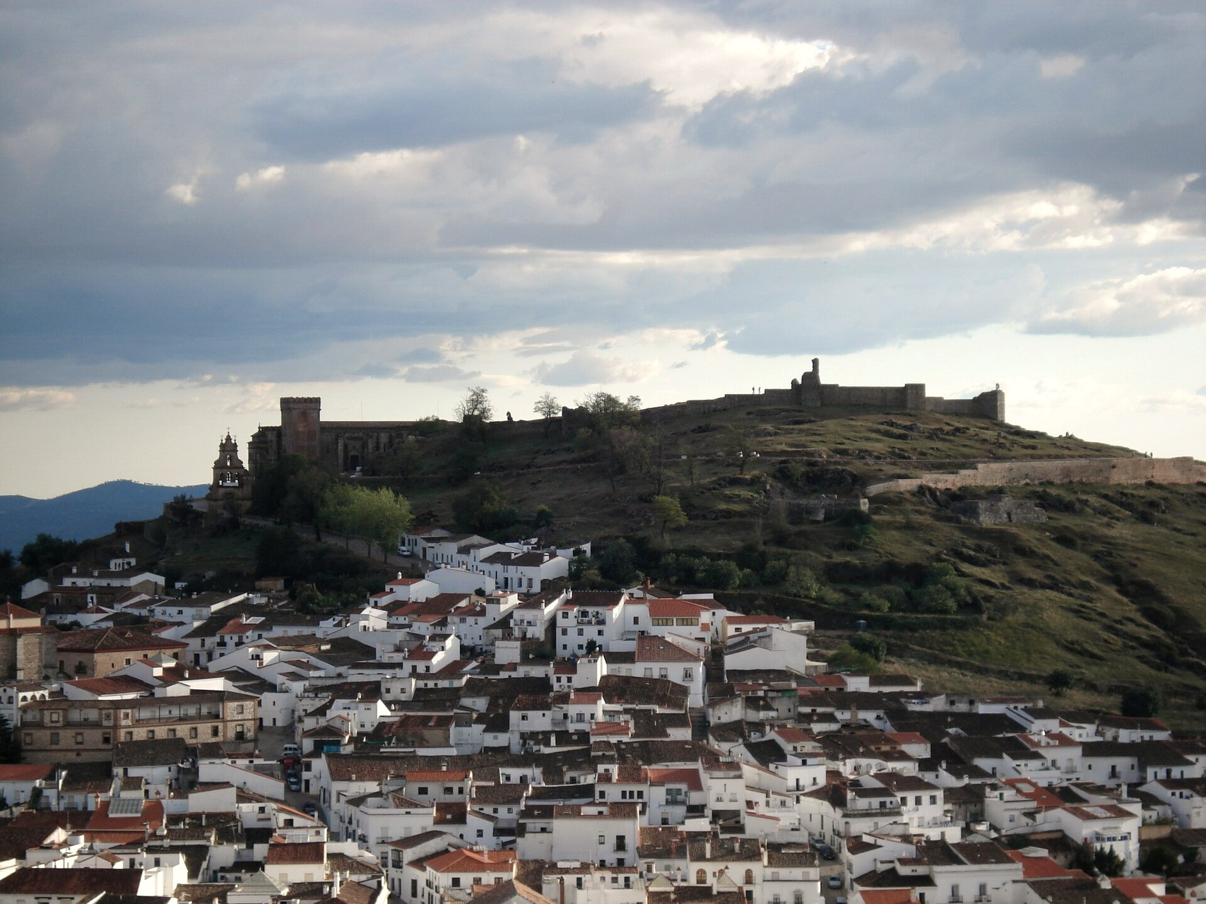 white village of Aracena and its castle seen from the sierra - Andalusia - Spain