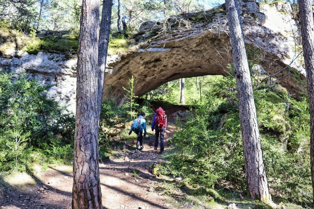 Walking beneath the Arcs de Saint Pierre on the Tarn and Jonte Gorges walk © Claire Durot