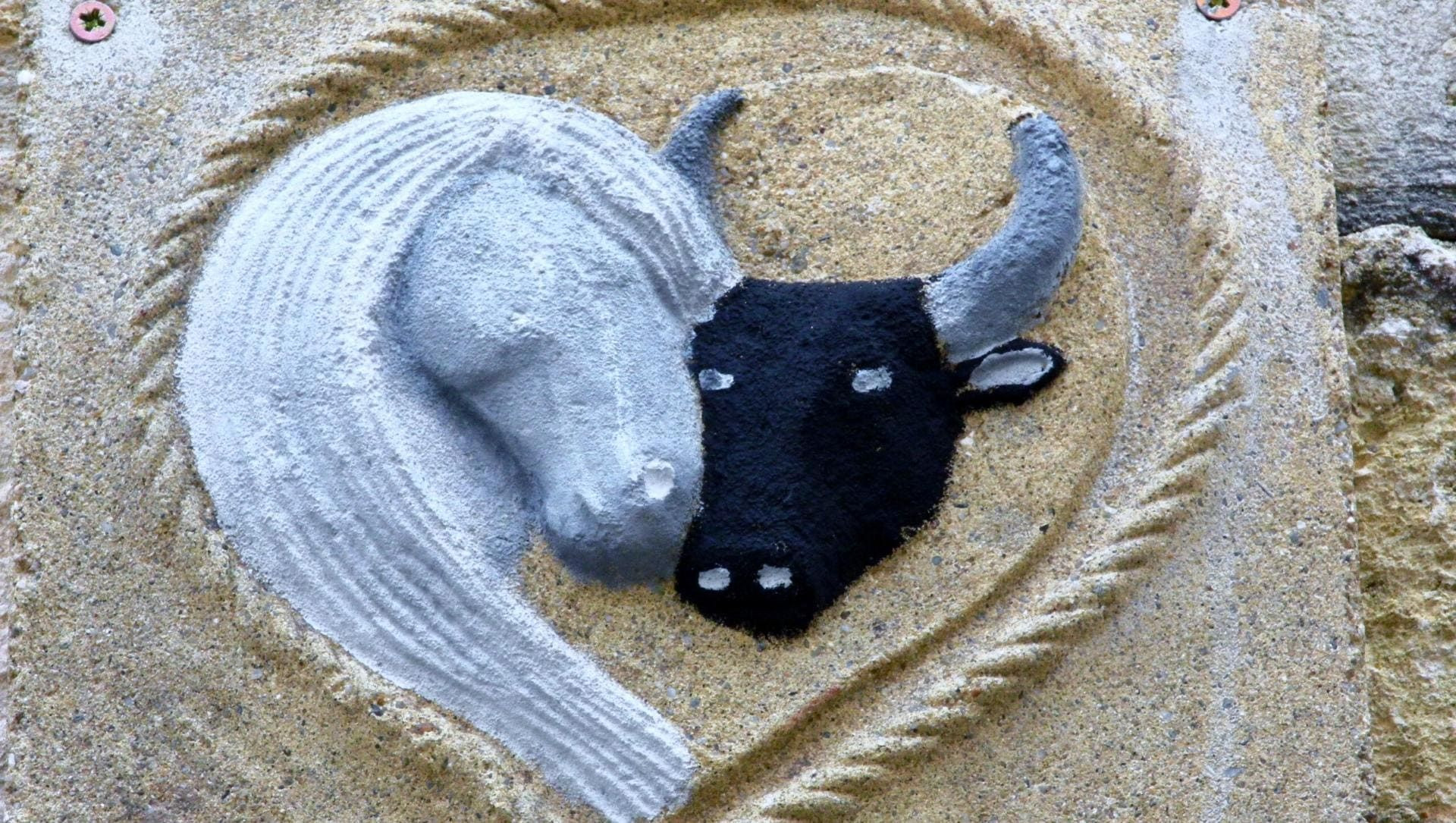 Bas-relief of white horse and Camargue bull - Camargue - France