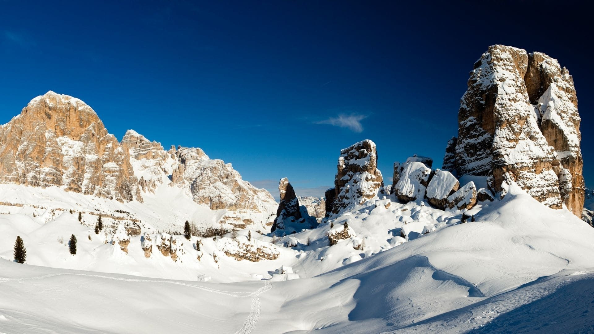 Snow-covered Cinque Torri in winter - Dolomites - Italy