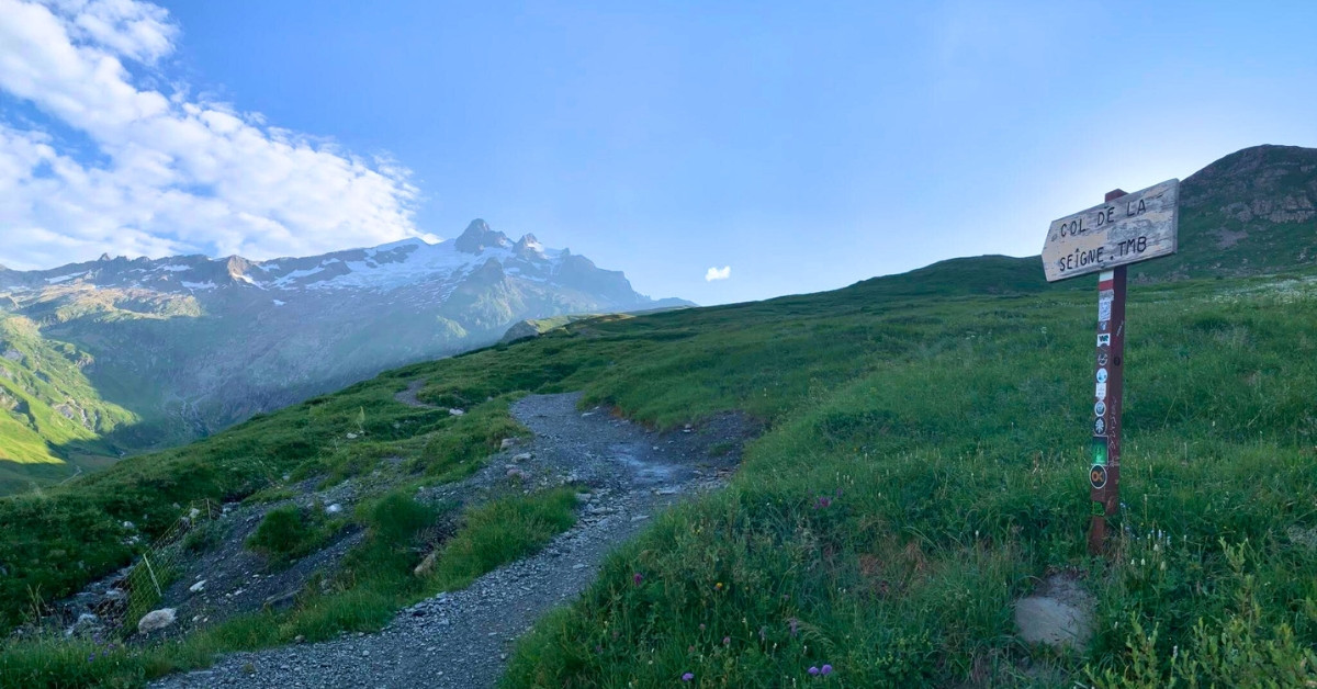 Trail and signpost at the Col de la Seigne - Tour du Mont Blanc - France