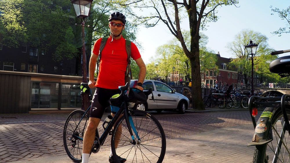 Cycling in the city of Amsterdam in the Netherlands © David Praire