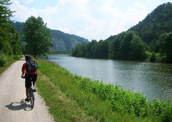 Cyclist on the canal towpath in the Altmühl Valley - Bavaria - Germany
