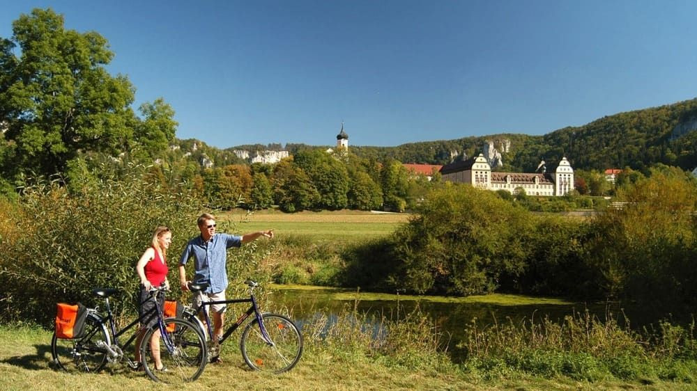 Cyclists near Beuron Abbey in the Danube valley - Germany