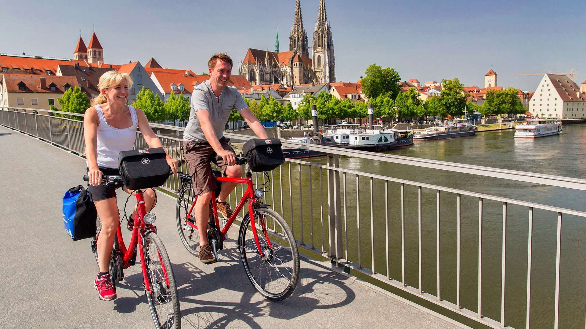Cyclists on a Danube bridge - Regensburg - Bavaria - Germany