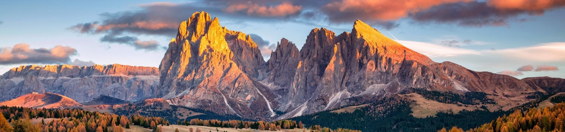 Sassolungo peaks at sunset - Dolomites - Italy