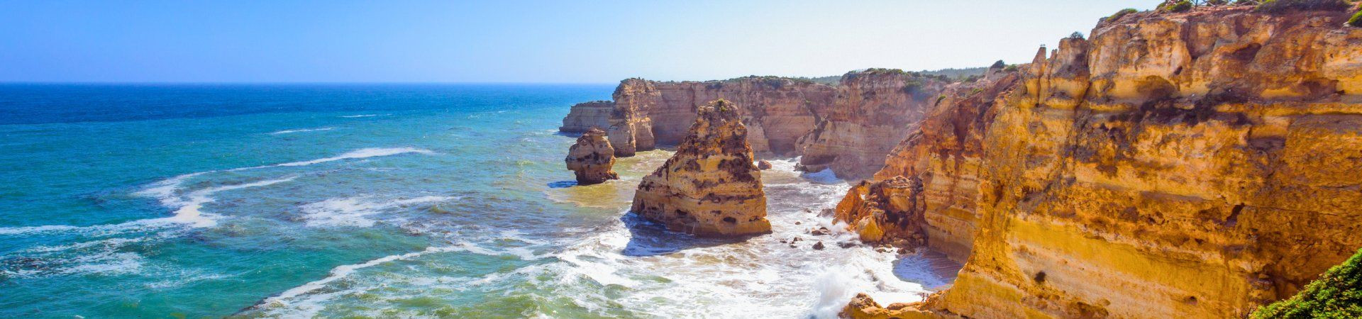 Golden cliffs and sea stacks - Algarve coast - Portugal