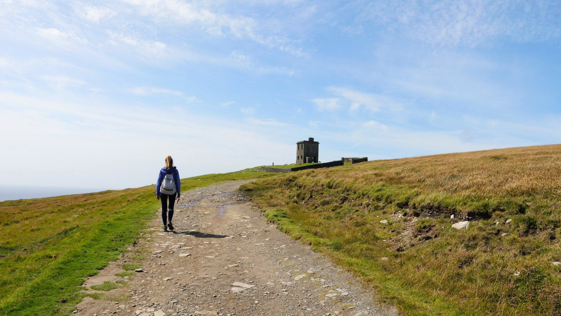 Hiker on the Ring of Kerry coast - Ireland