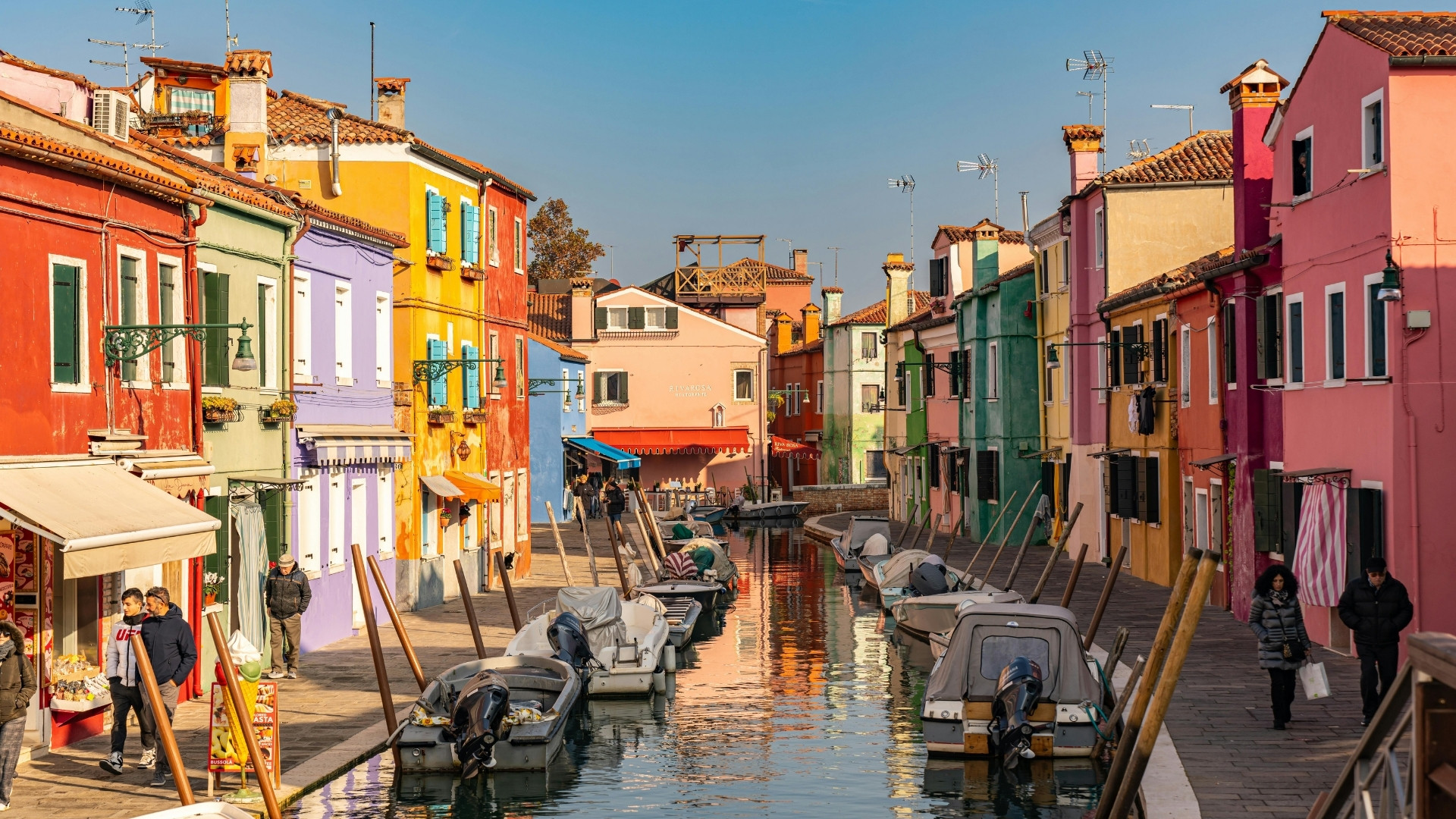 Colorful houses along a canal - Burano - Venice - Italy