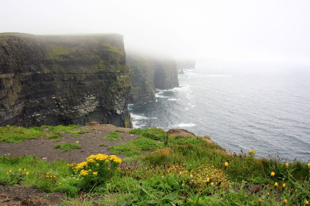 Mist rising over the Cliffs of Moher
