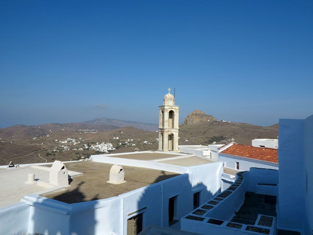 The granite peak of Xobourgo seen from the rooftops of Kechrovounio Monastery