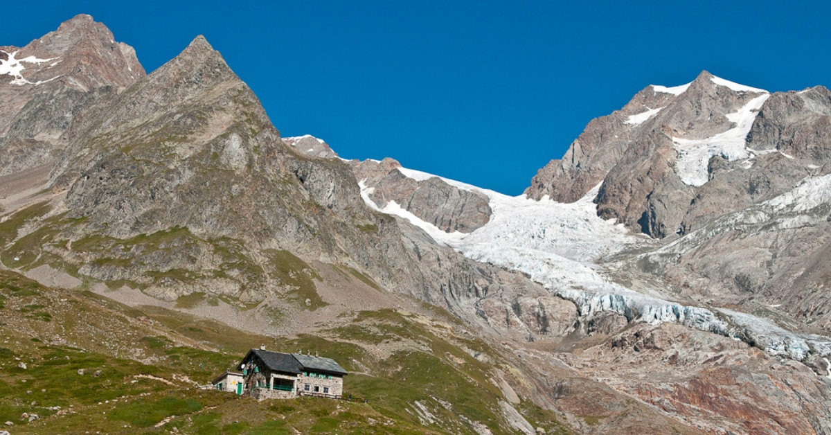Mountain hut below the glacier - Val Veny - Italy