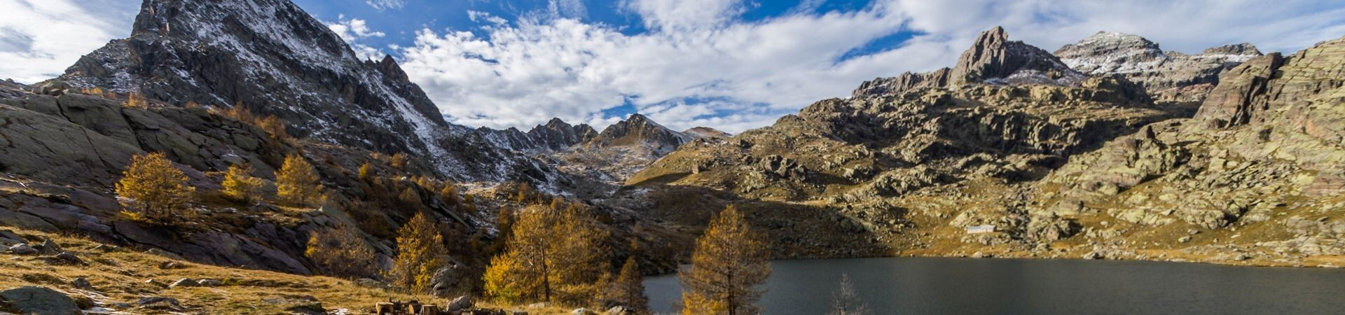 Mountain lake and autumn larches - Mercantour National Park - French Alps