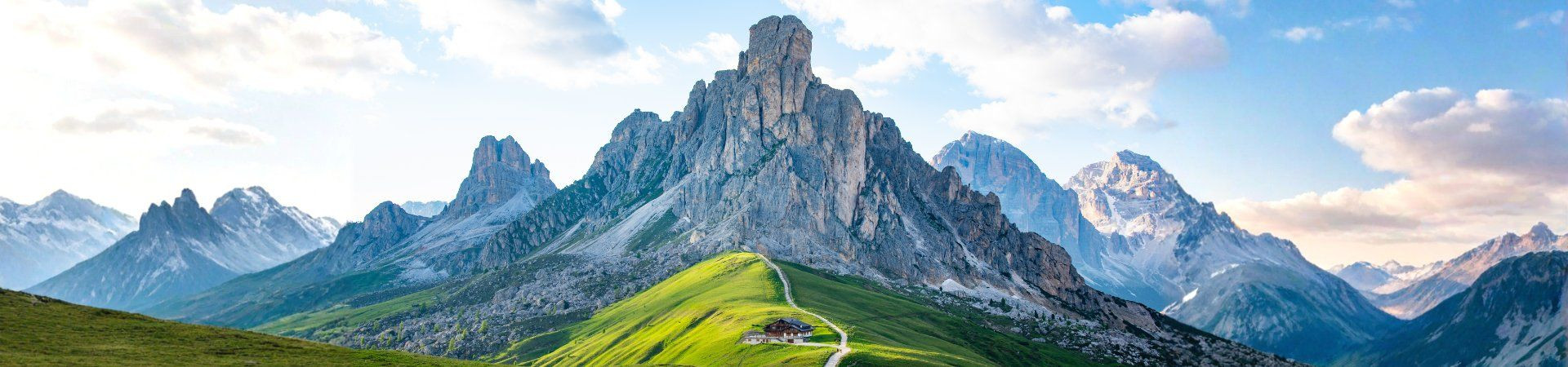 Rocky peaks and green meadows of Passo Giau - Dolomites - Italy