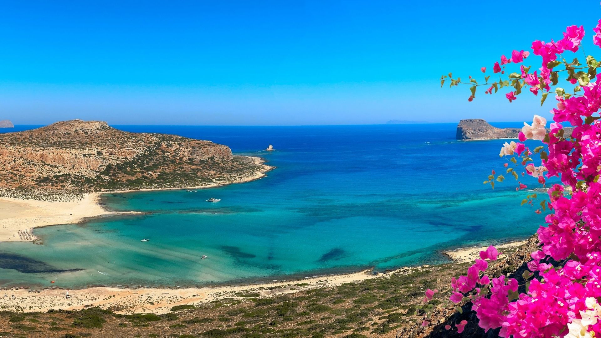 Turquoise Balos lagoon and bougainvillea - Crete - Greece