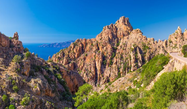 Red granite rock formations above the sea - Calanques de Piana - Corsica, France