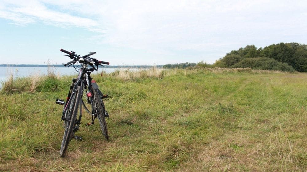 Bicycle resting by the shore of Lake Müritz - Mecklenburg - Germany