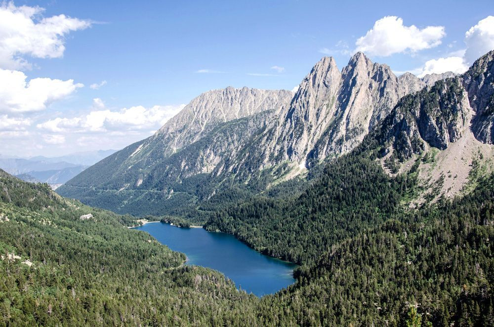 Towards Amitges Refuge, San Maurici Lake at the foot of the Encantats Needles