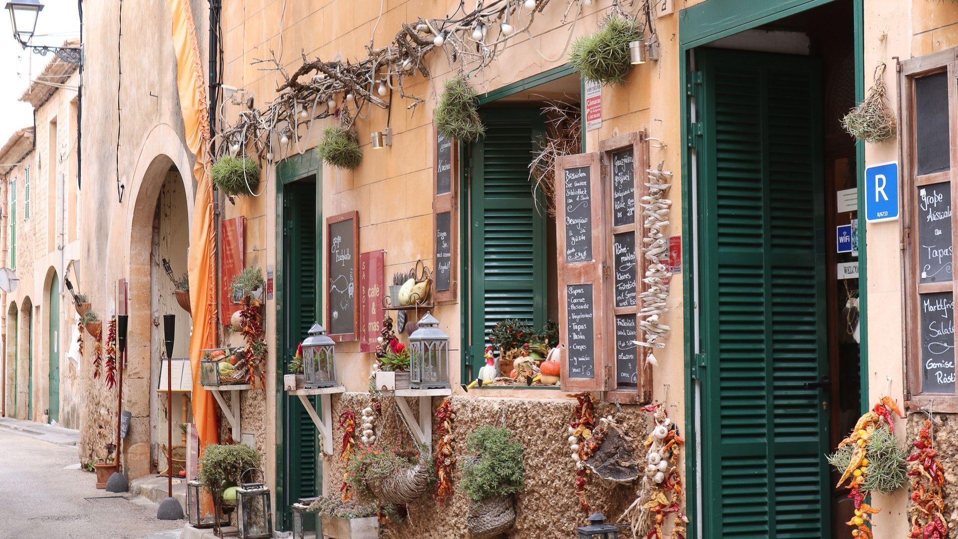 Village shop front with green shutters - Mallorca - Spain