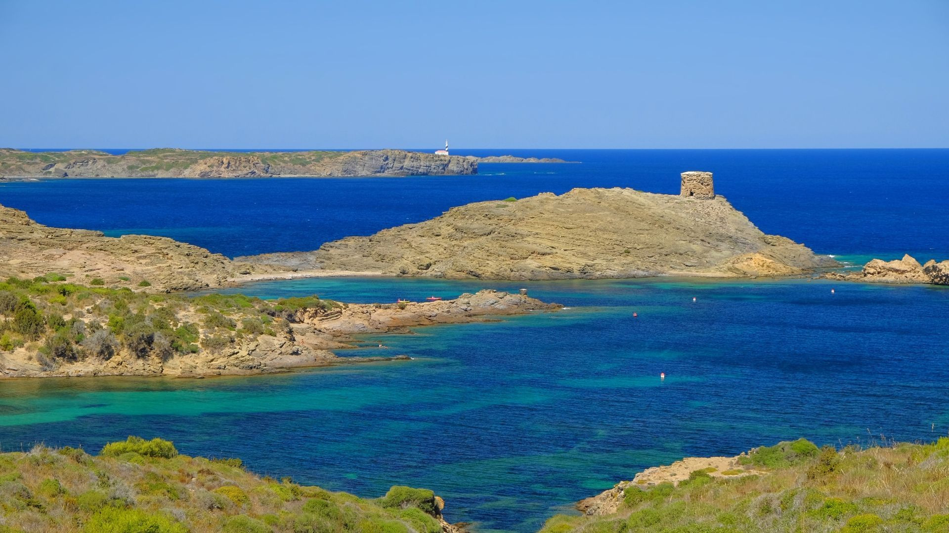 Wild coastline and watchtower near Es Grau - Menorca - Spain